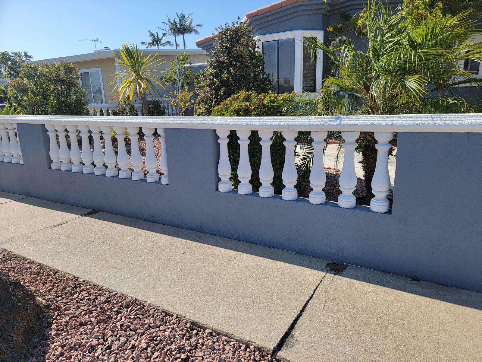 Harbor City fence repaired with new stucco spray application