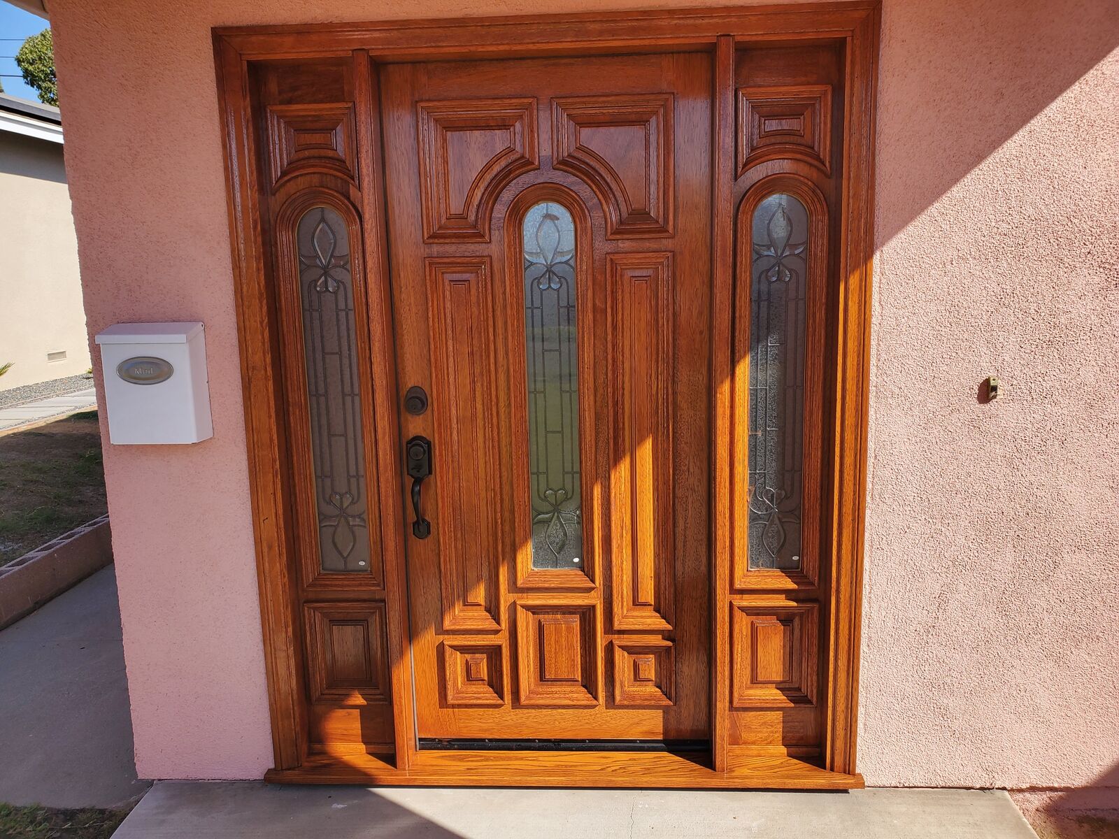 Entry door in Gun Stock semi-transparent stain, Carson